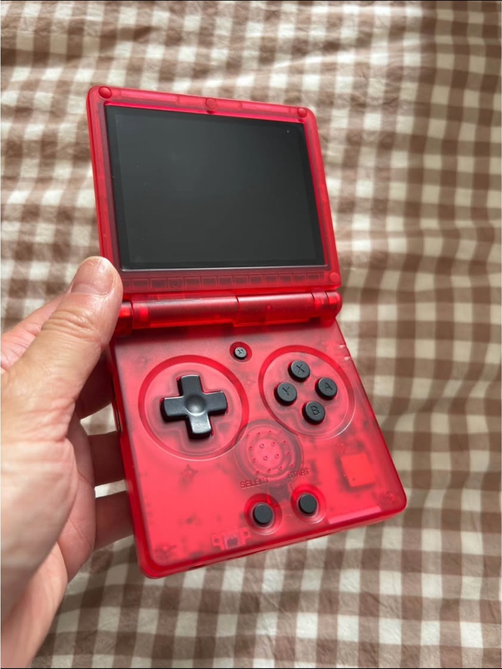 Hand held red gaming console